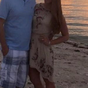 Nude, sheer Haute Hippie dress with embroidered flower detail on front and back